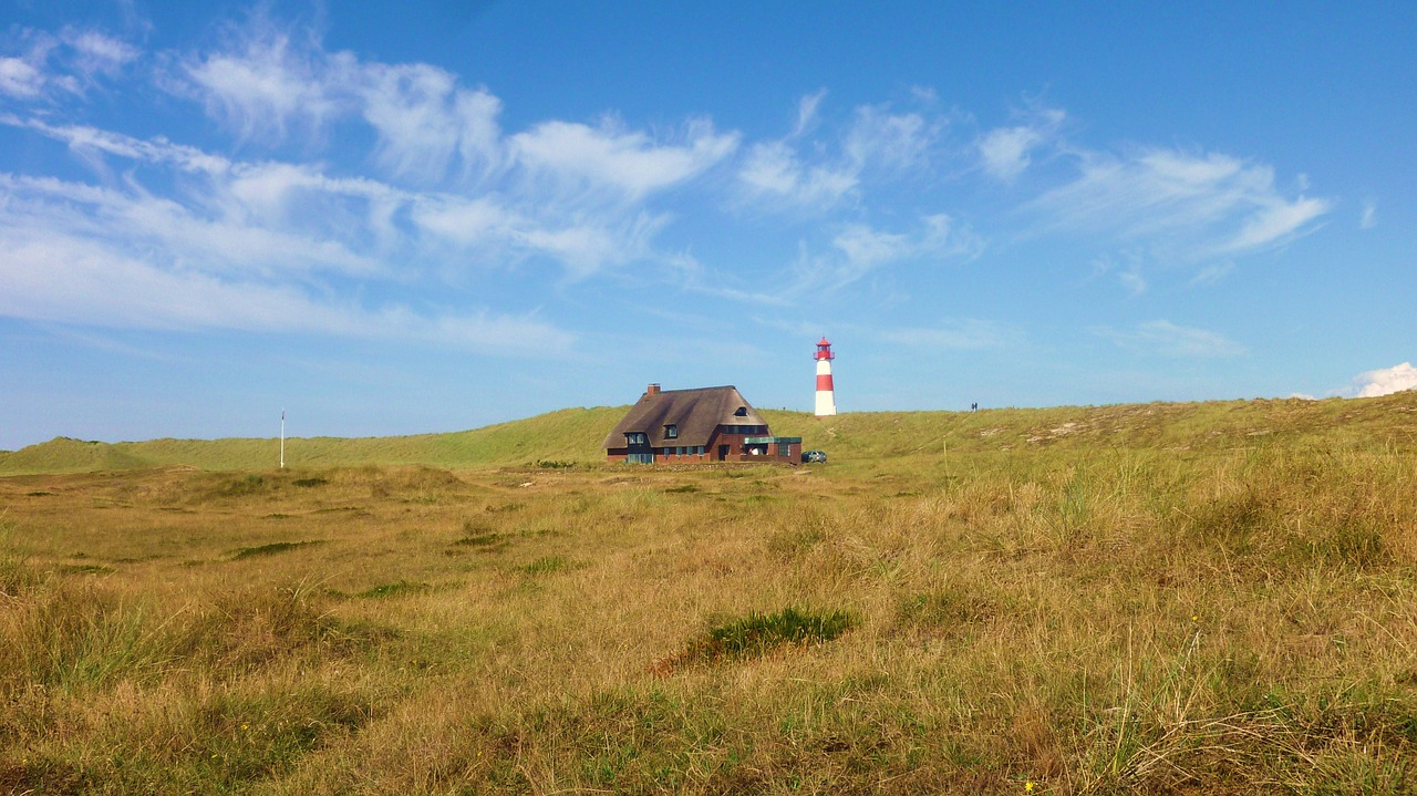 lighthouse dunes holiday free photo