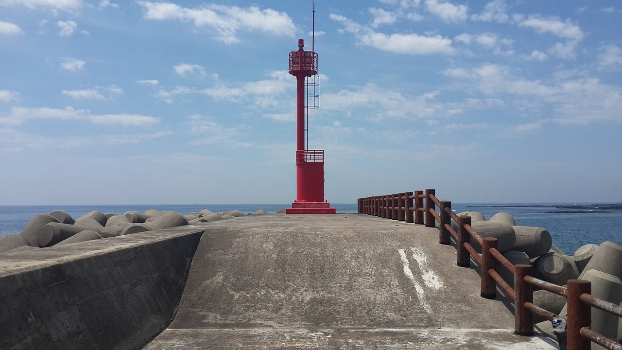 lighthouse sea sky free photo