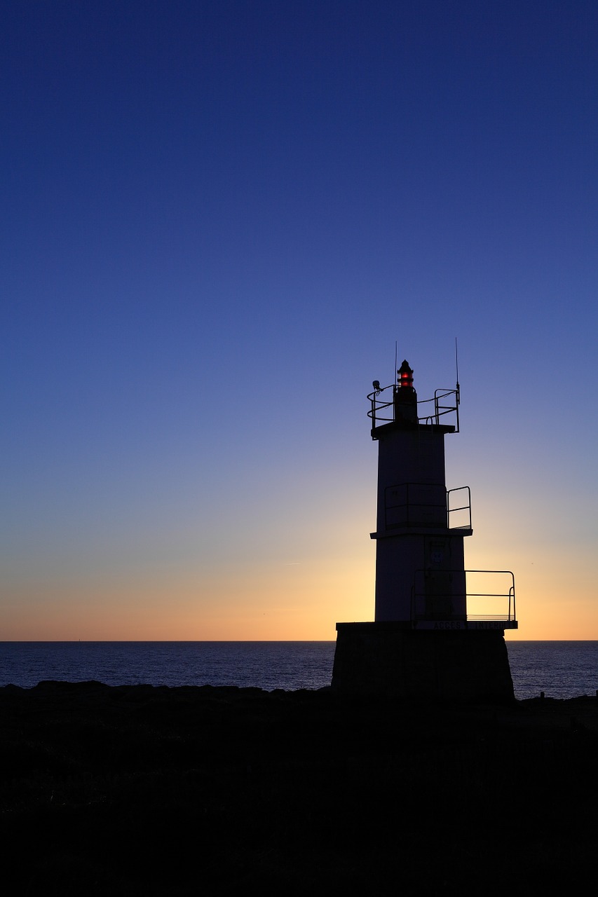 lighthouse sunset sky free photo