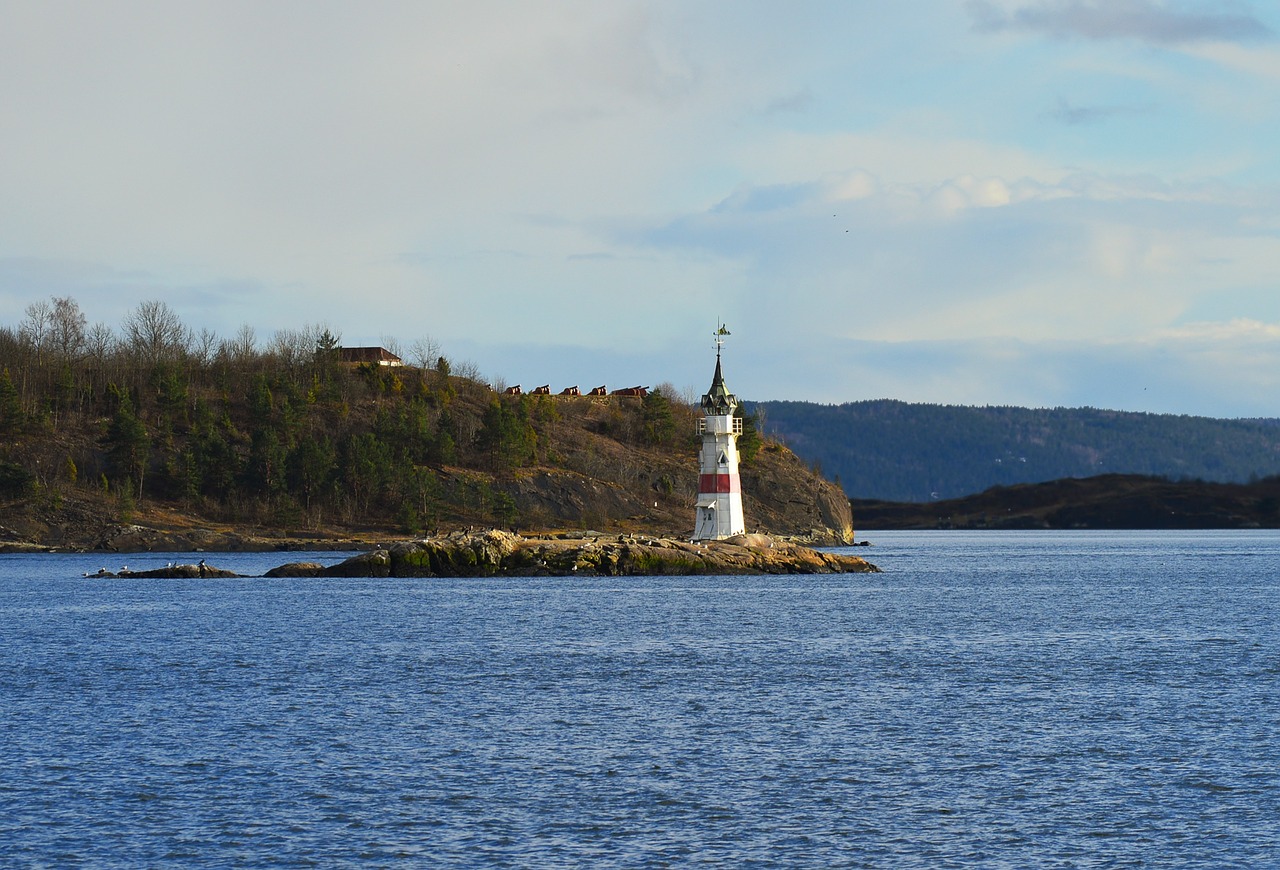 lighthouse island sea free photo