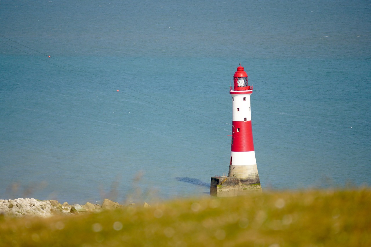 lighthouse water lake free photo