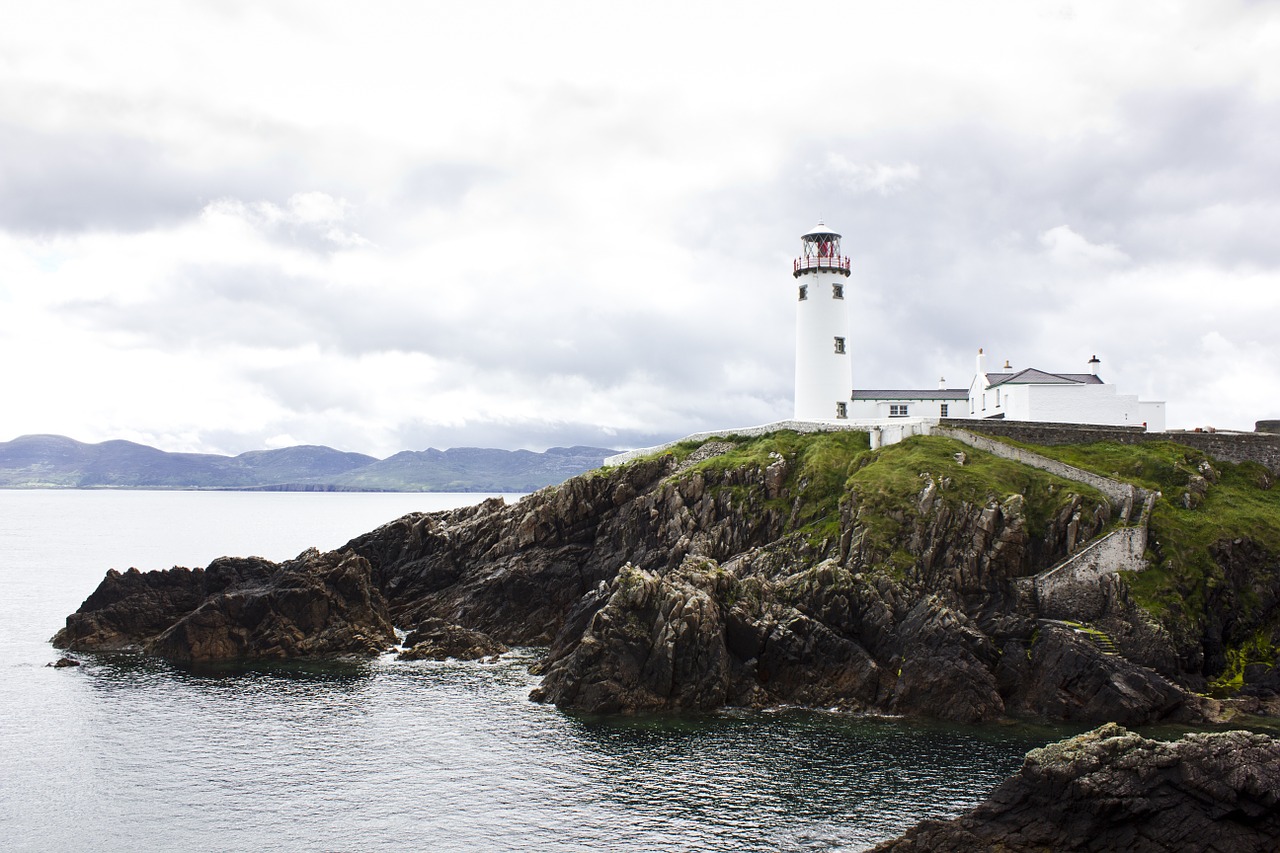 lighthouse ireland sea free photo