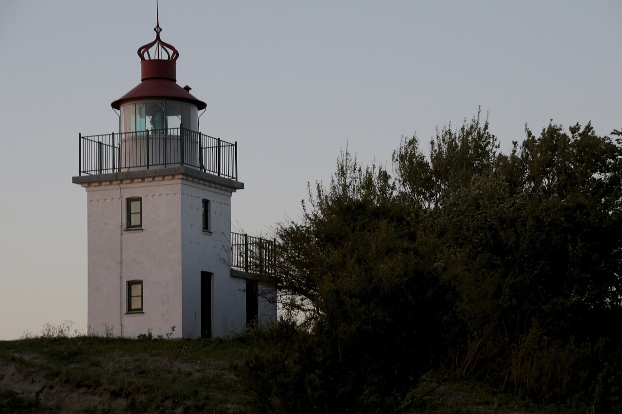 lighthouse tree sundown free photo