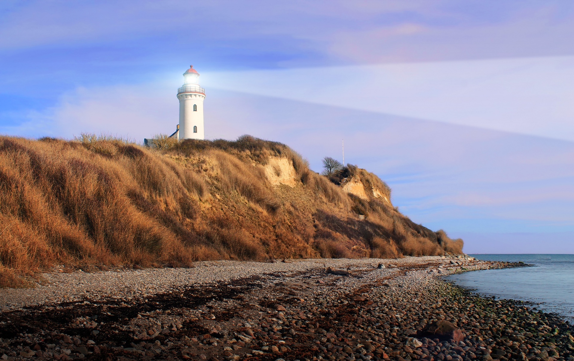 coastline lighthouse sea free photo