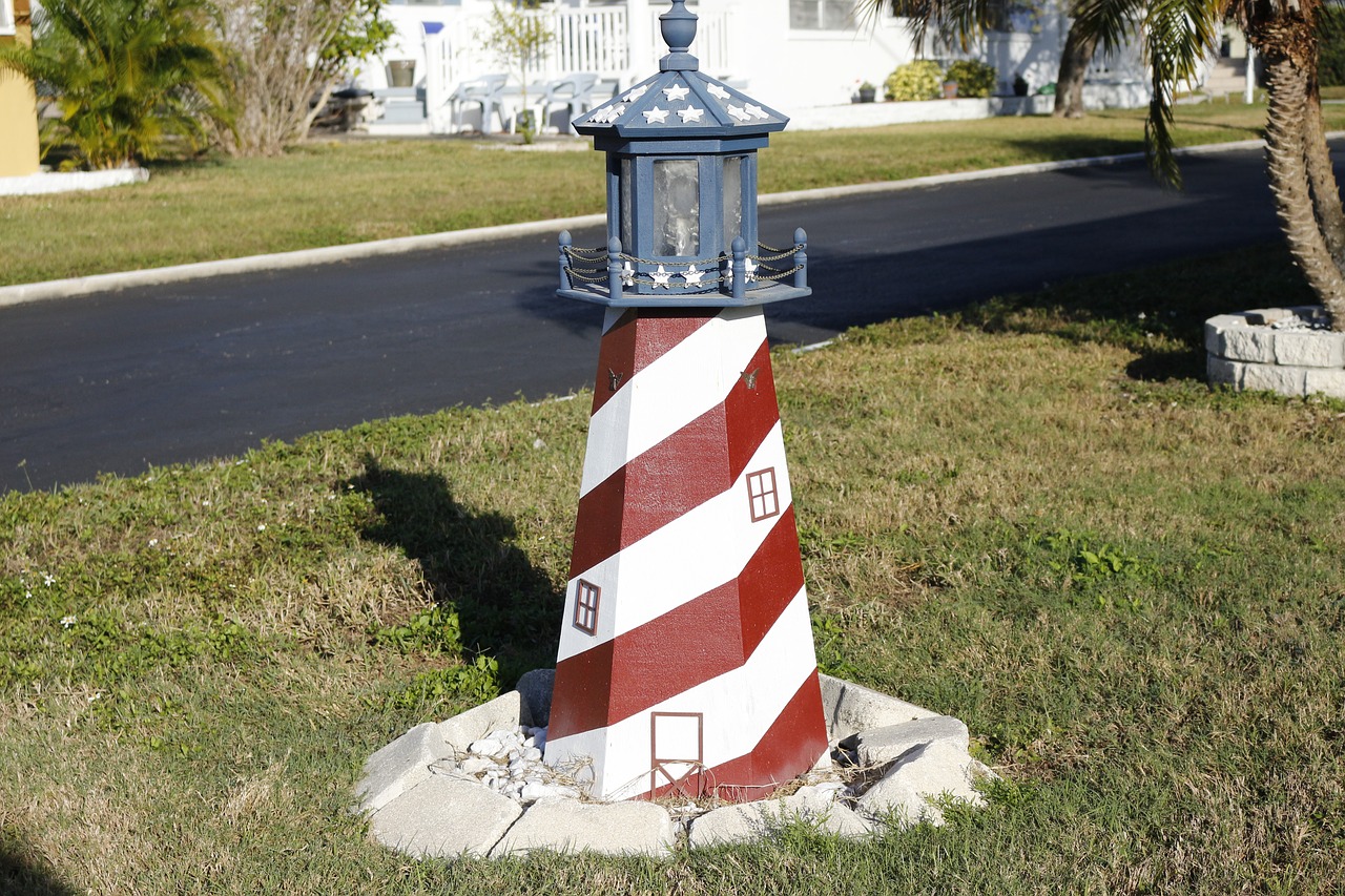 lighthouse sailor garden figure free photo