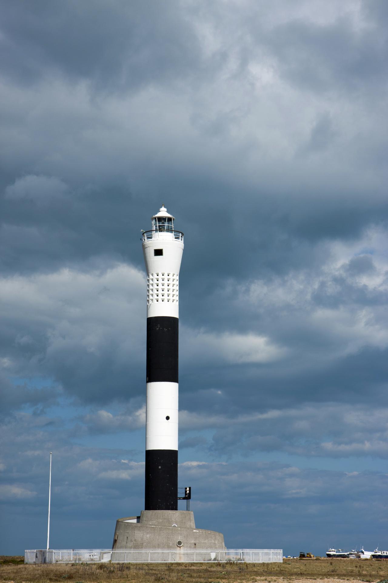 lighthouse stormy sky free photo