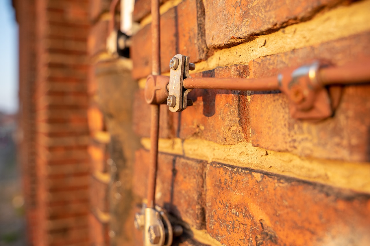 lightning arrester  brick  wall free photo