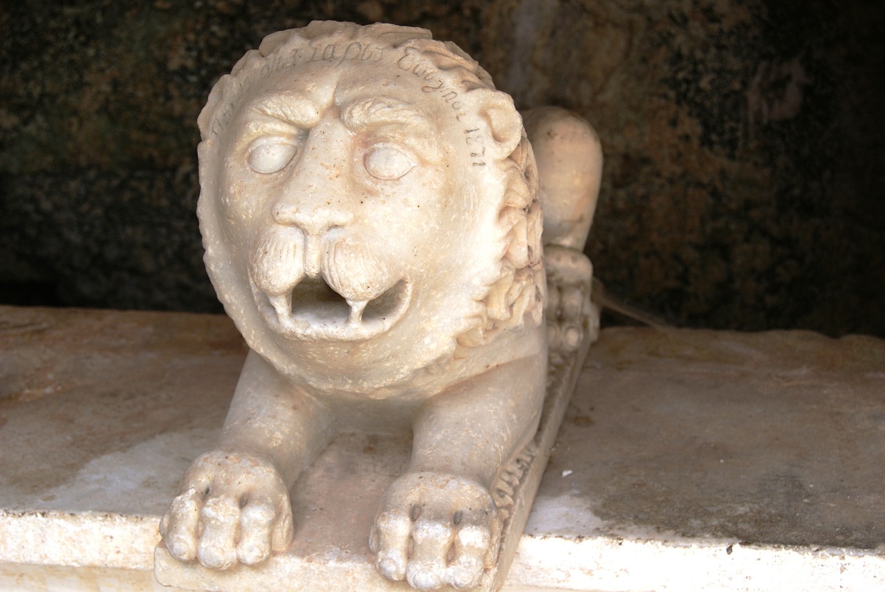 lion statue mythology free photo