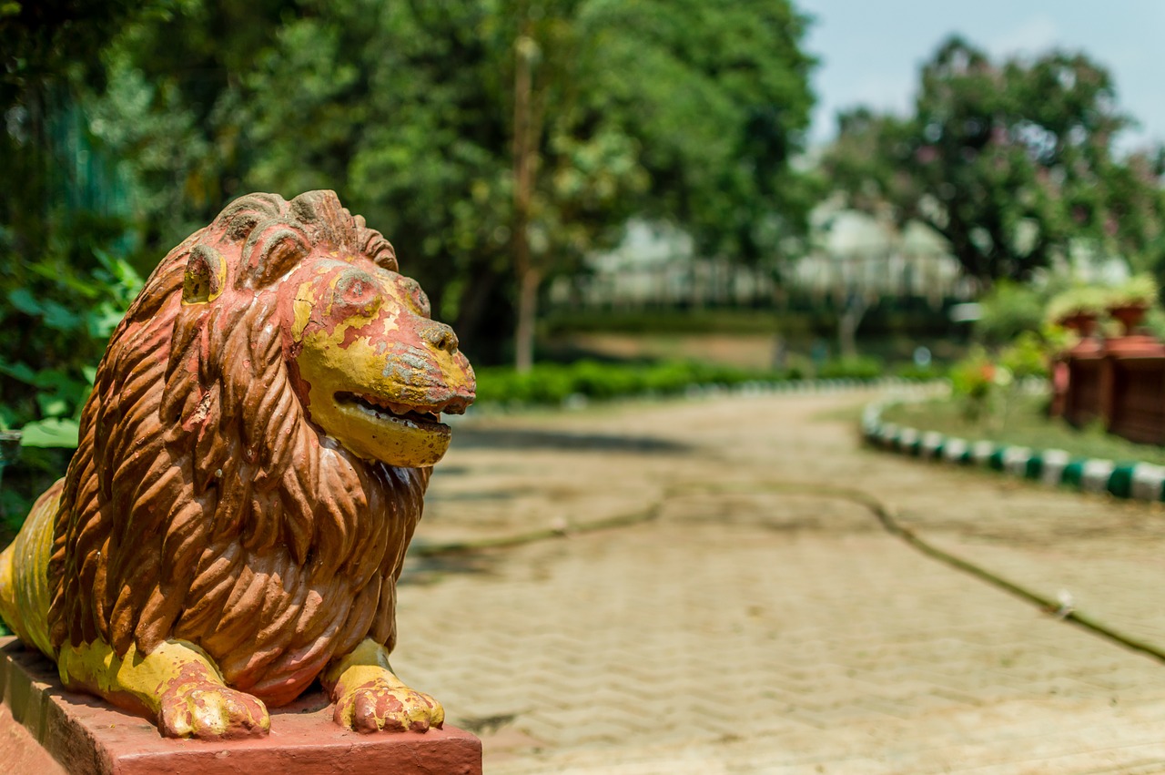 lion statue garden free photo