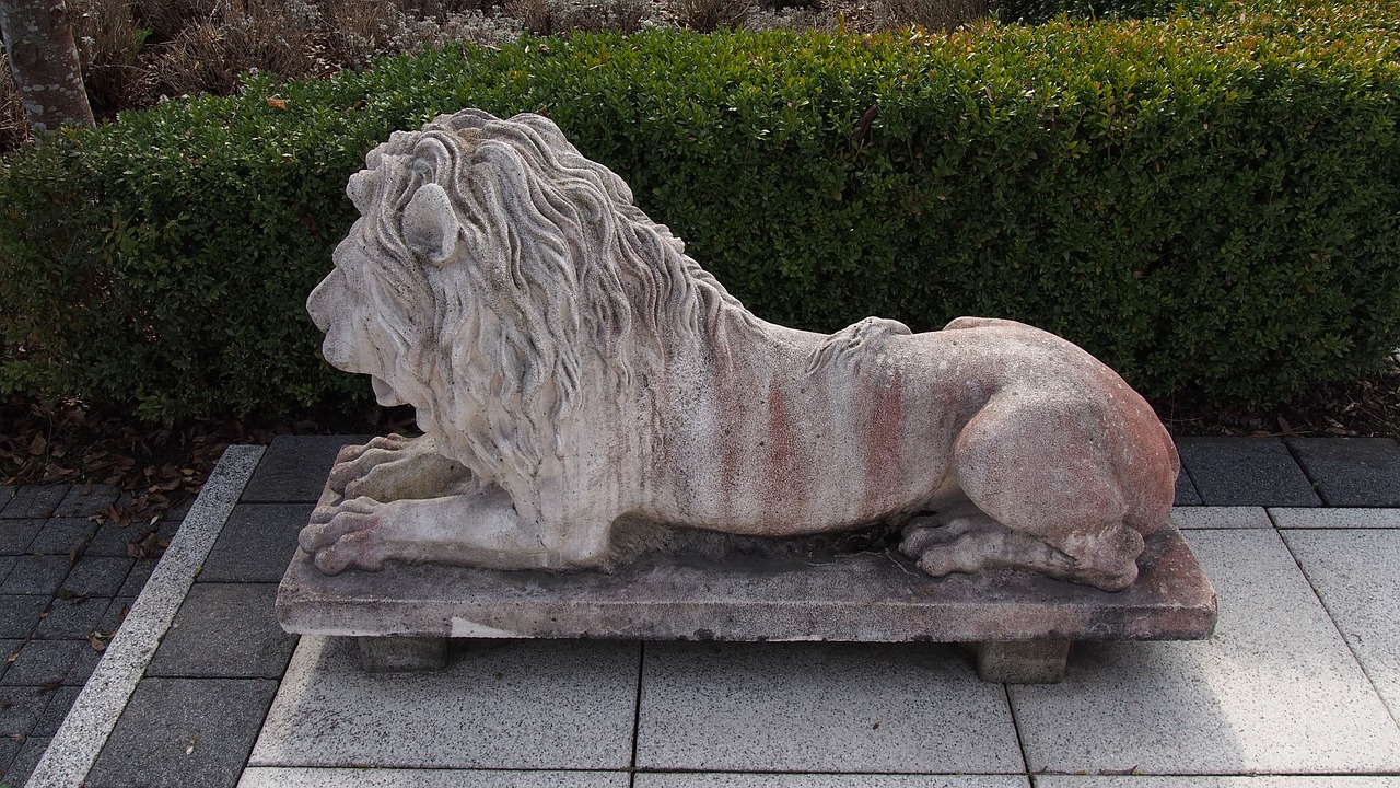 lion sculpture stone figure free photo