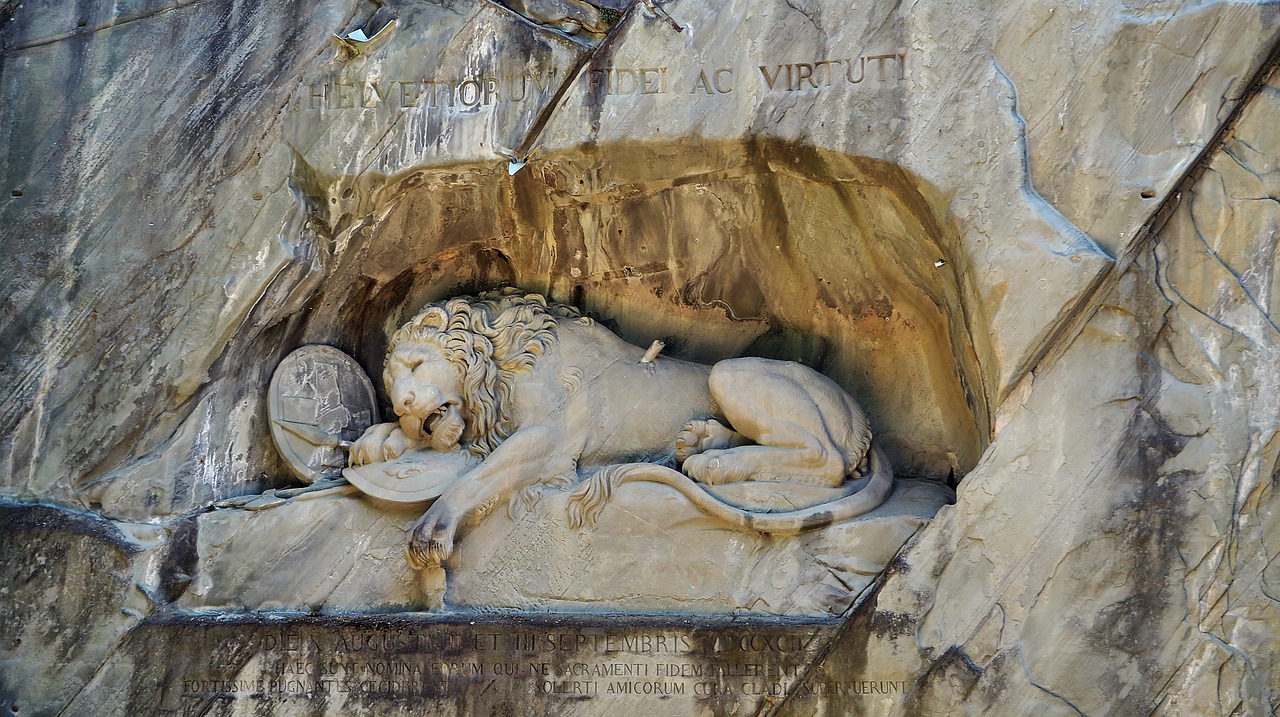 lion monument  lucerne  lion free photo