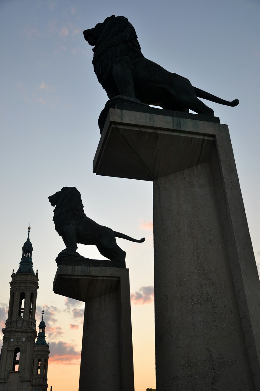 lions silhouettes sculpture free photo