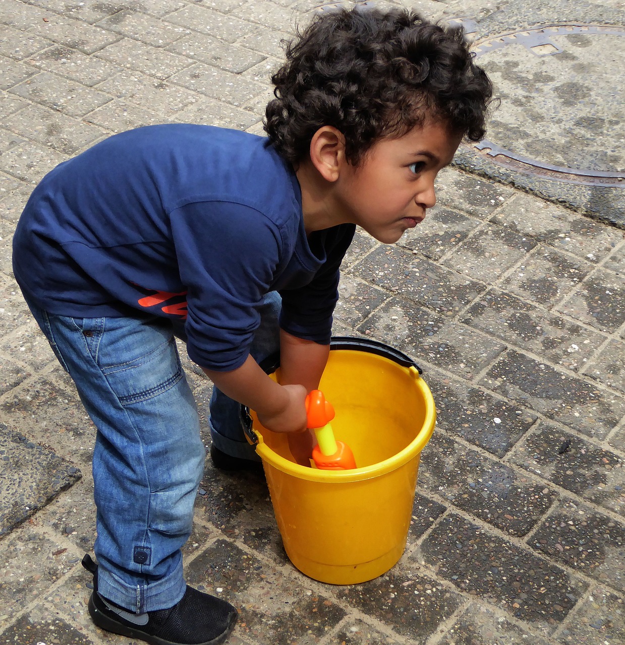 little boy play water gun free photo