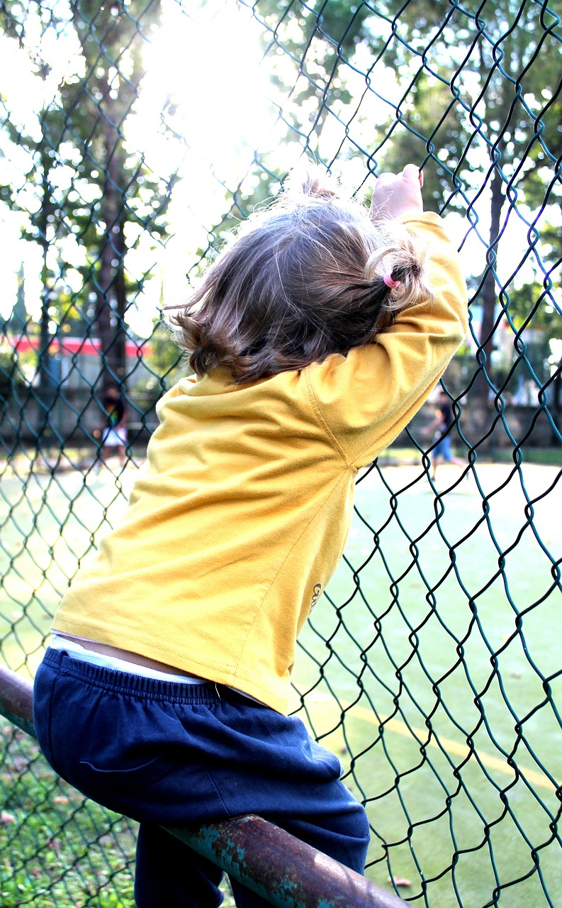 little girl railing park free photo