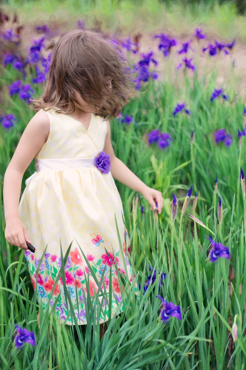 little girl in wind summer flowers free photo