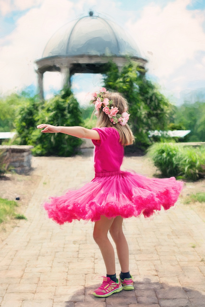 little girl twirling dancing outdoors free photo