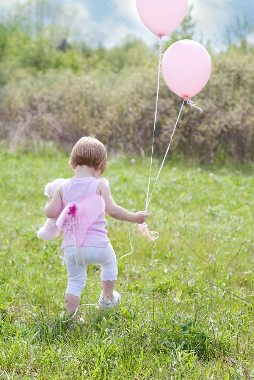 little girl with balloons summer happiness free photo