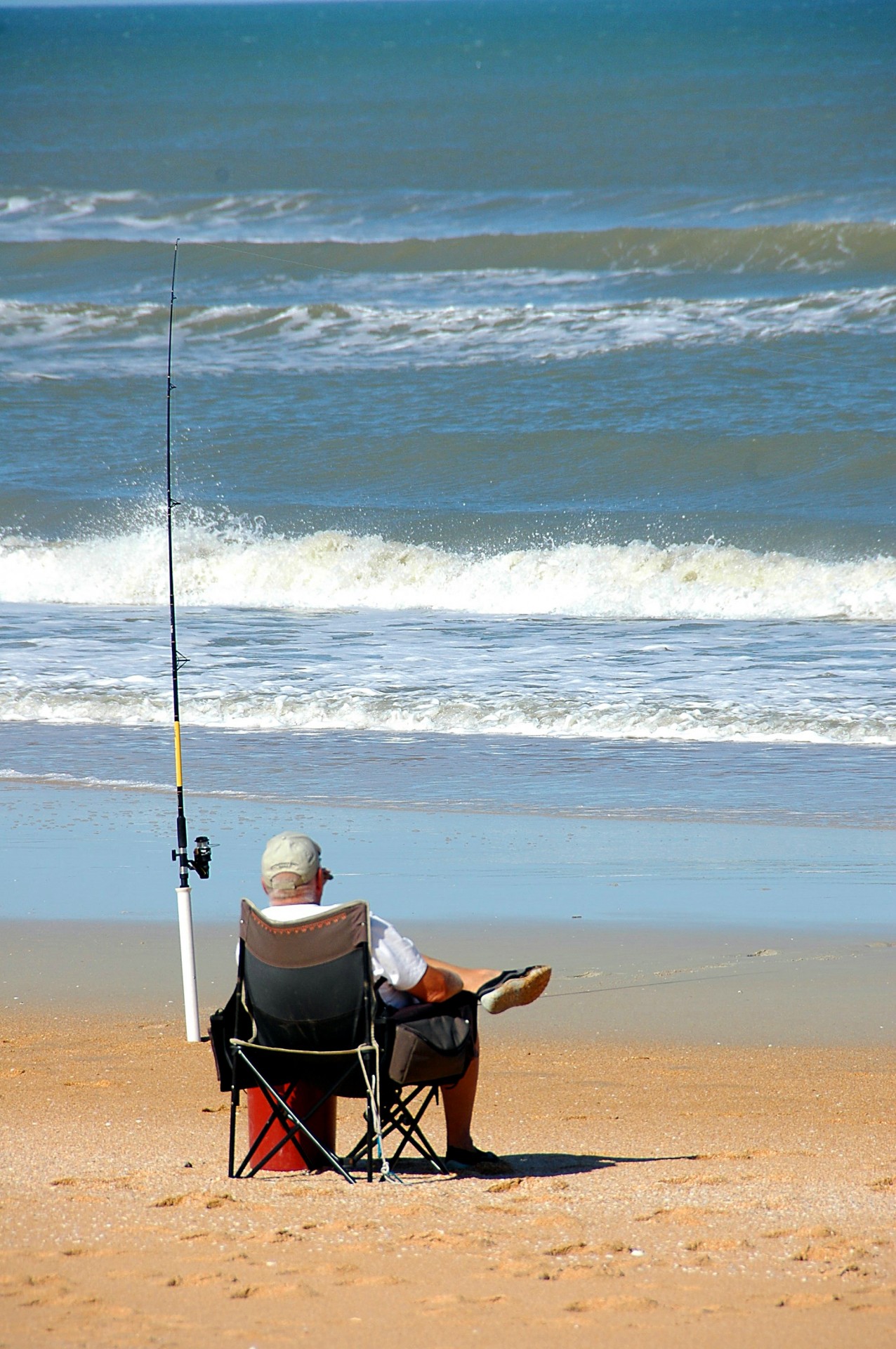 alone fisherman surf fishing free photo