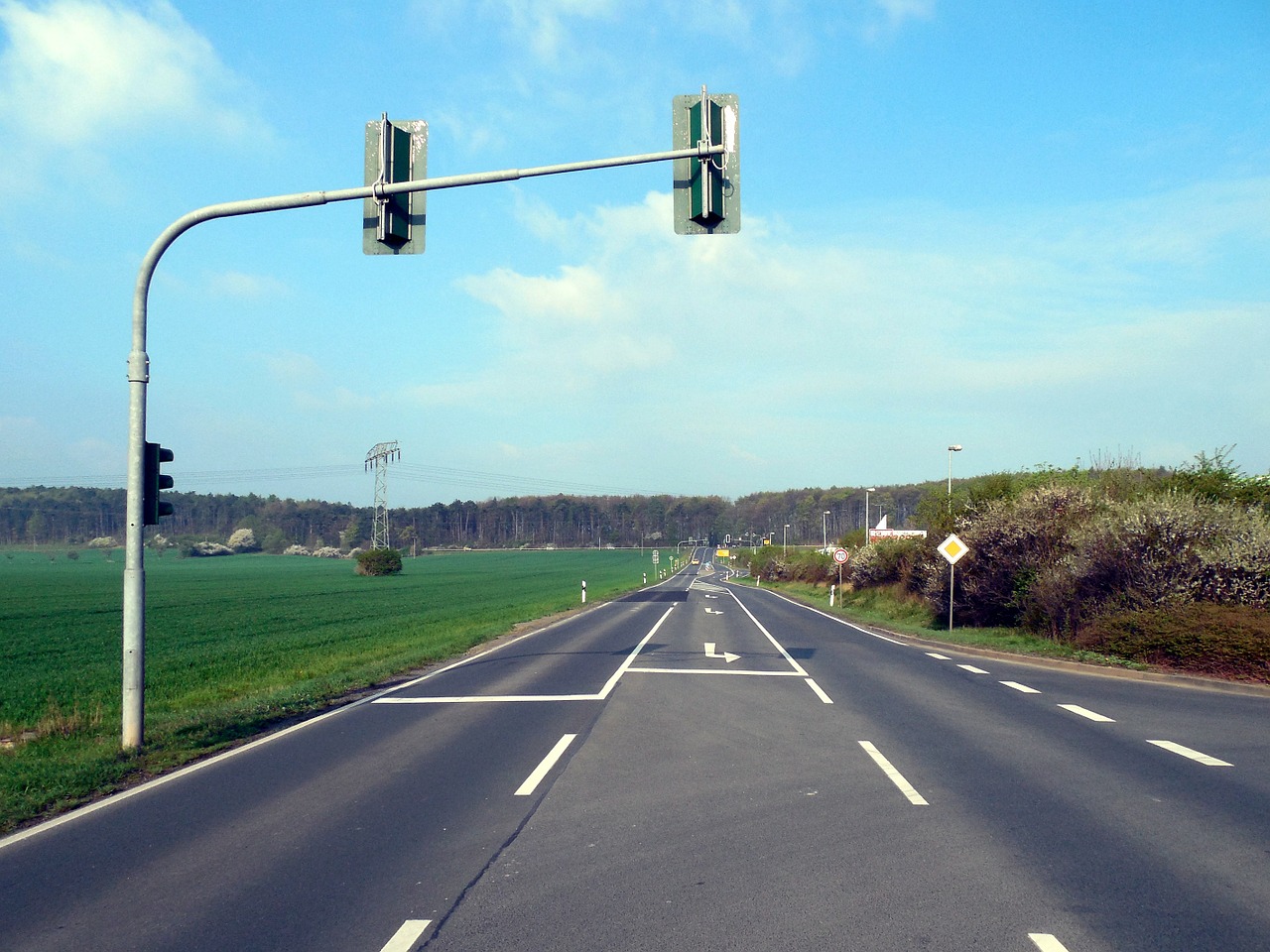 lonely road traffic lights free photo