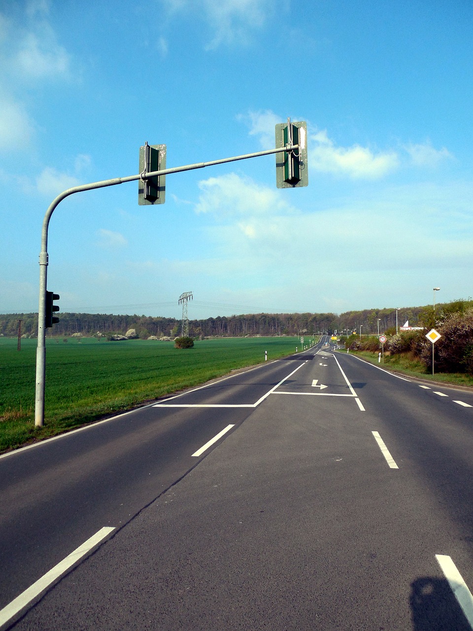 lonely road traffic lights free photo