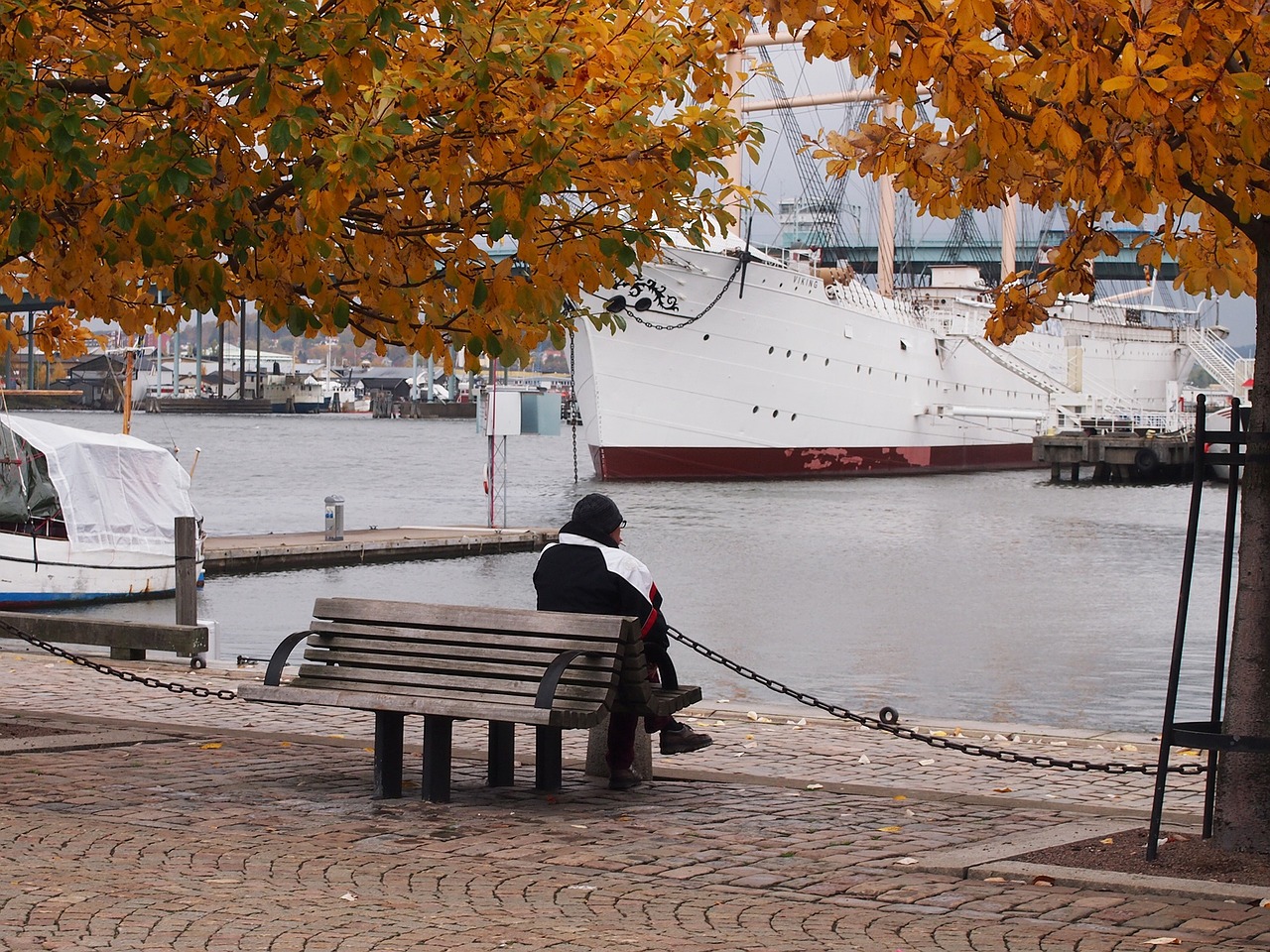 lonely man bench rest free photo