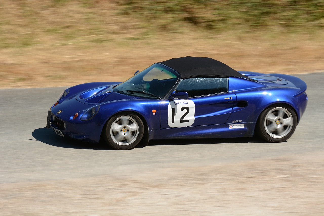 lotus  blue  race car free photo