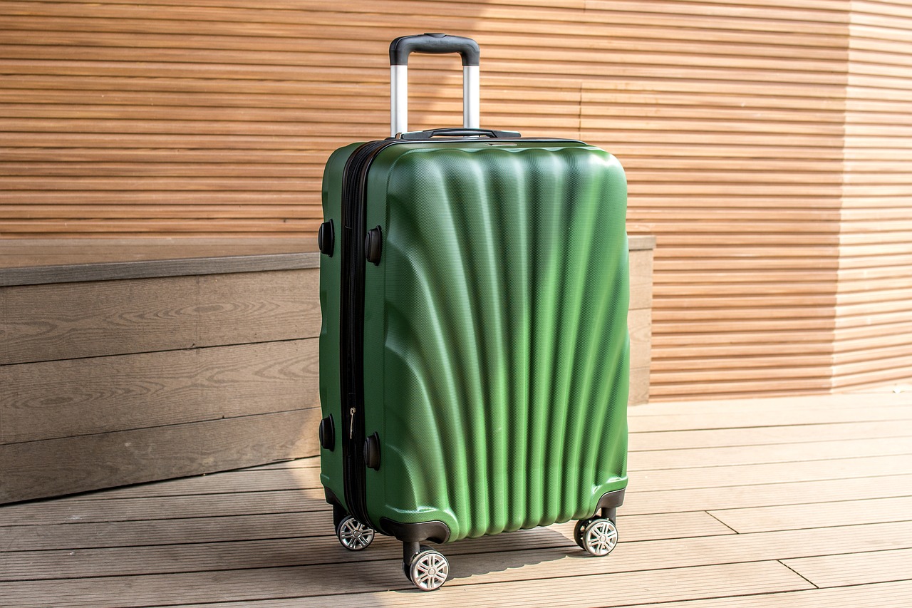 luggage on wheels case outdoor free photo