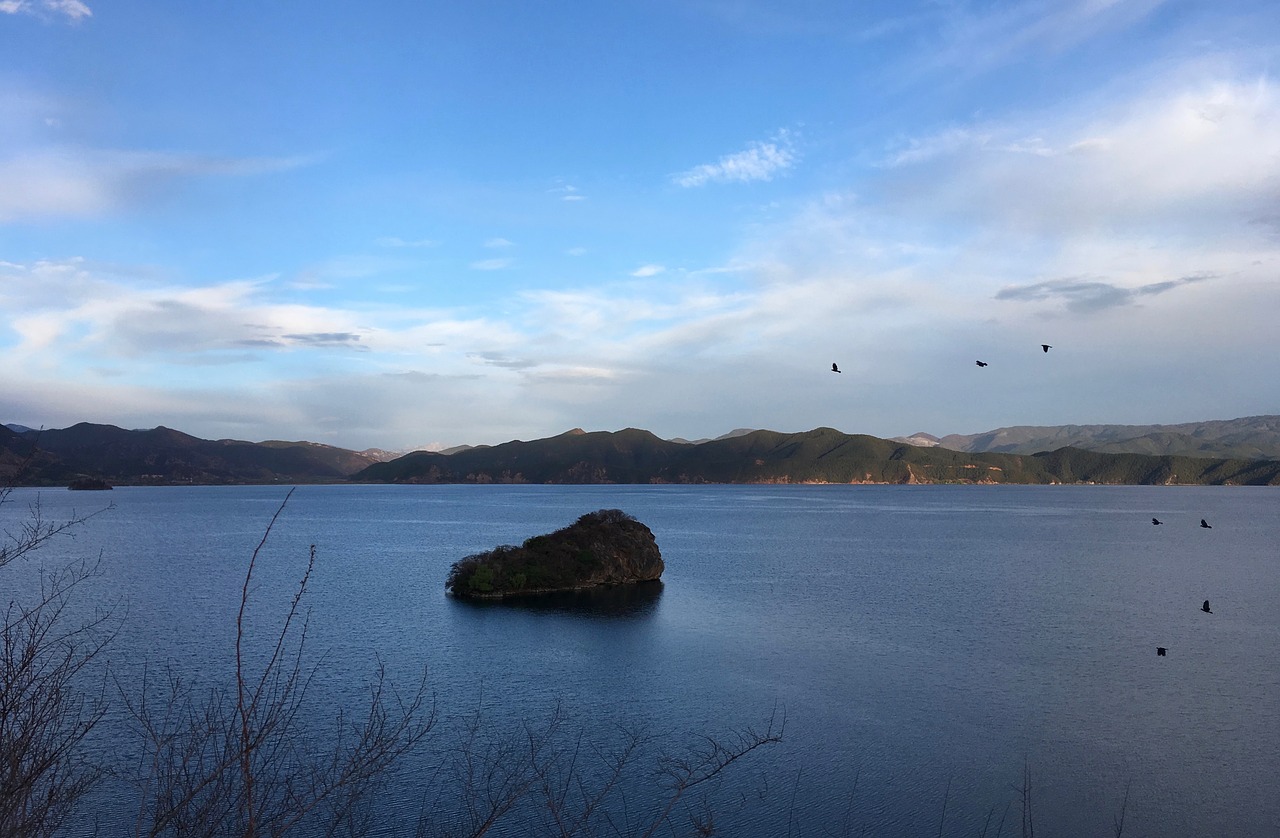 lugu lake  small luo water  mountains free photo