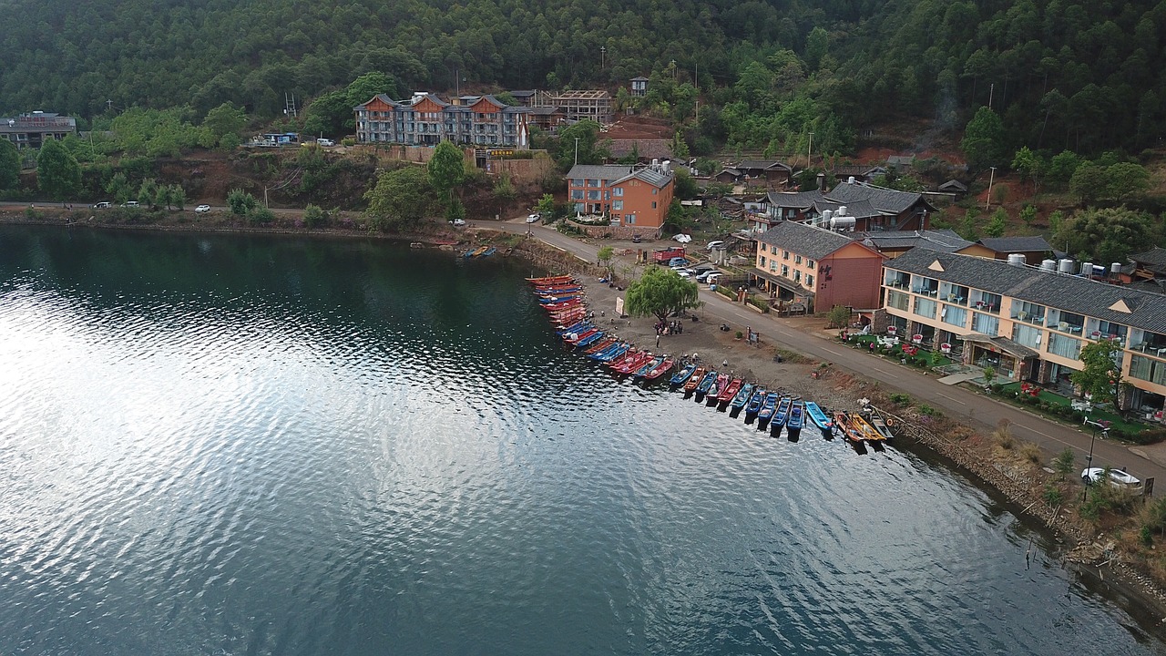 lugu lake  china  boats free photo