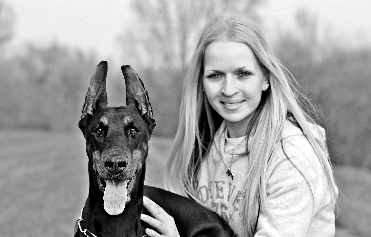 i dog and woman black and white free photo