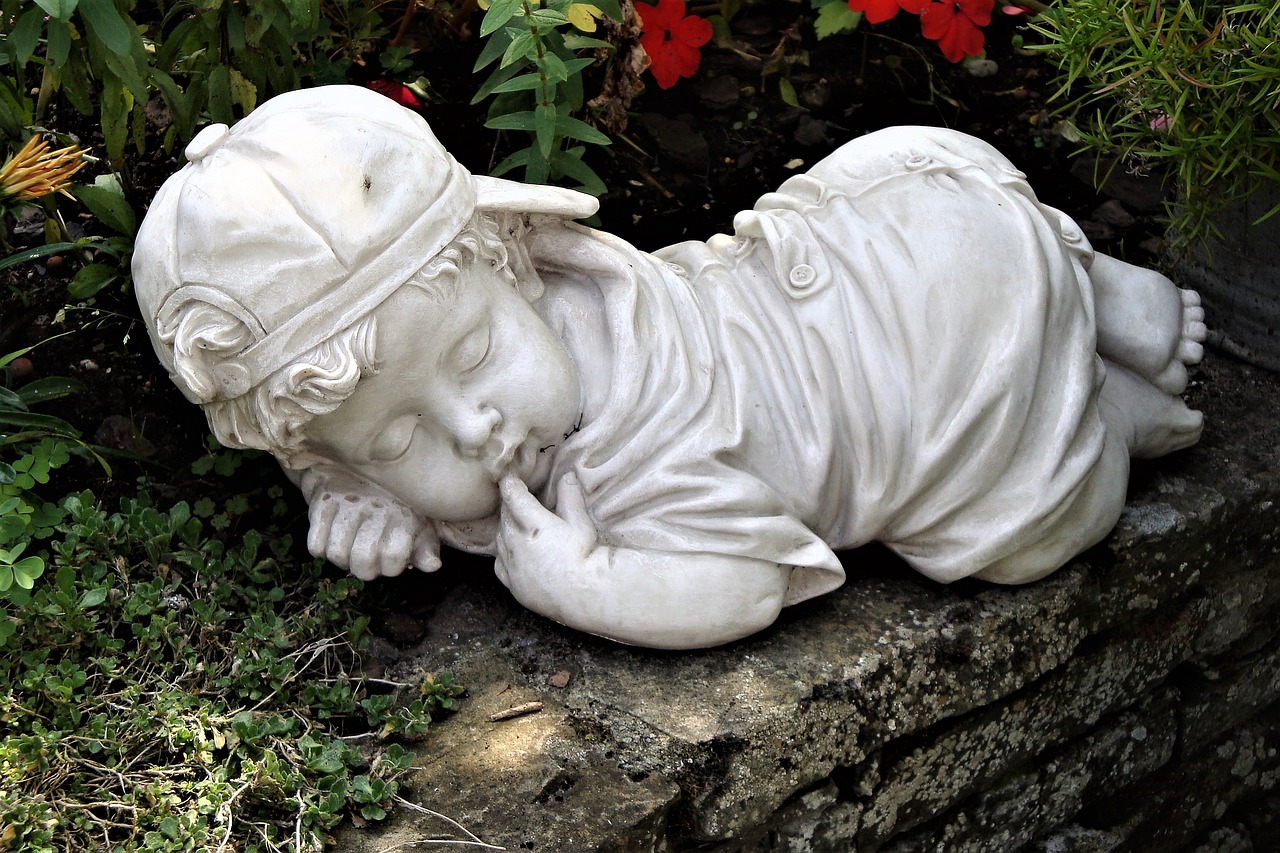 lying young sculpture art free photo