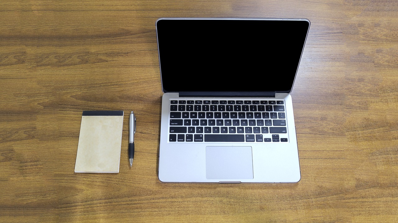 macbook pro desk table free photo