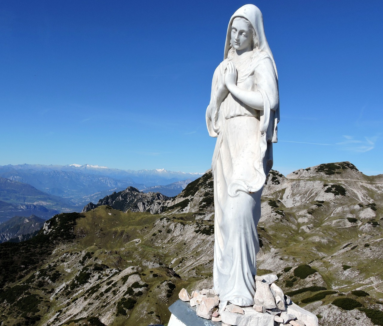 madonna statue mountain free photo