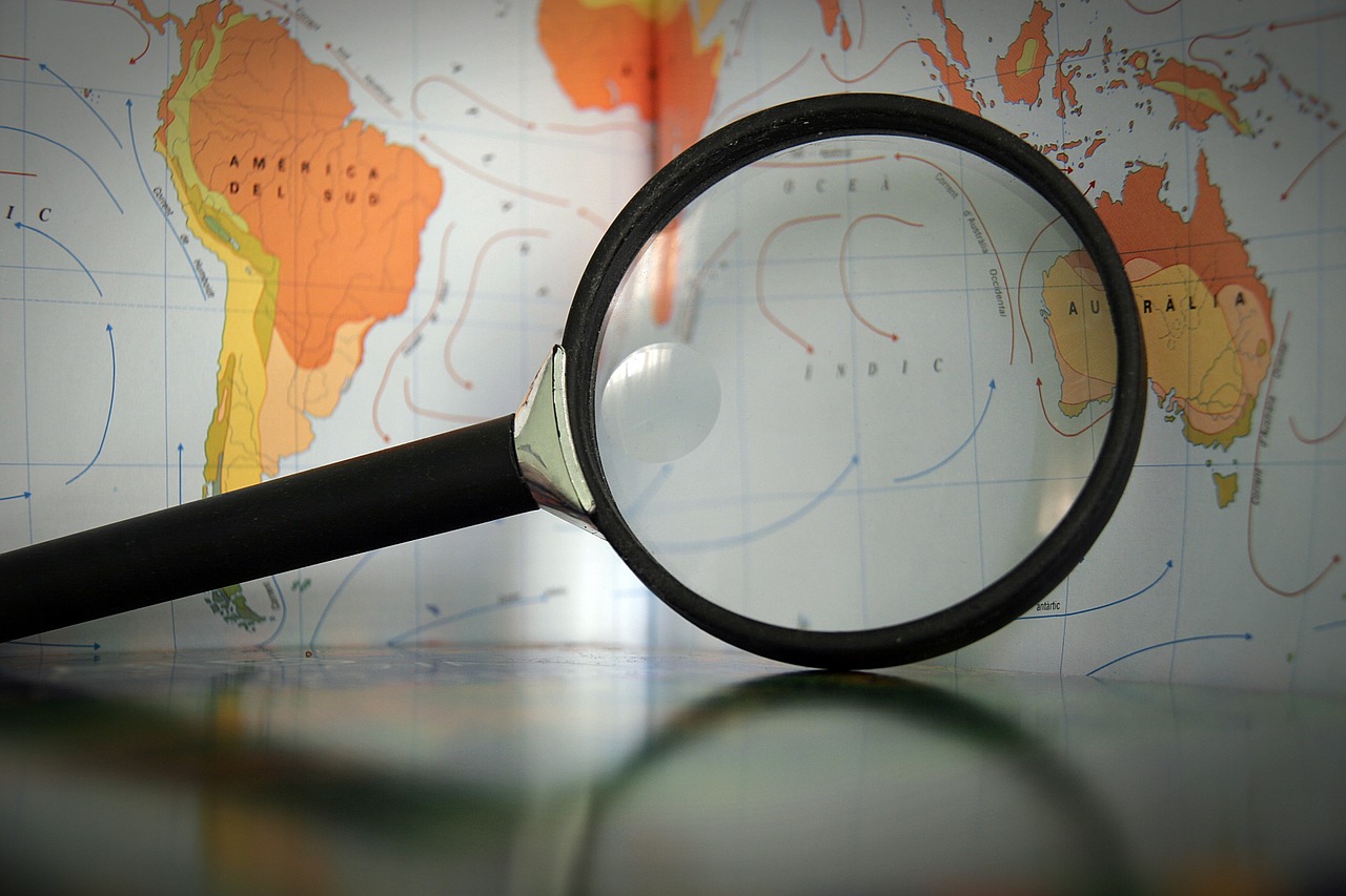 magnifying glass map geography free photo