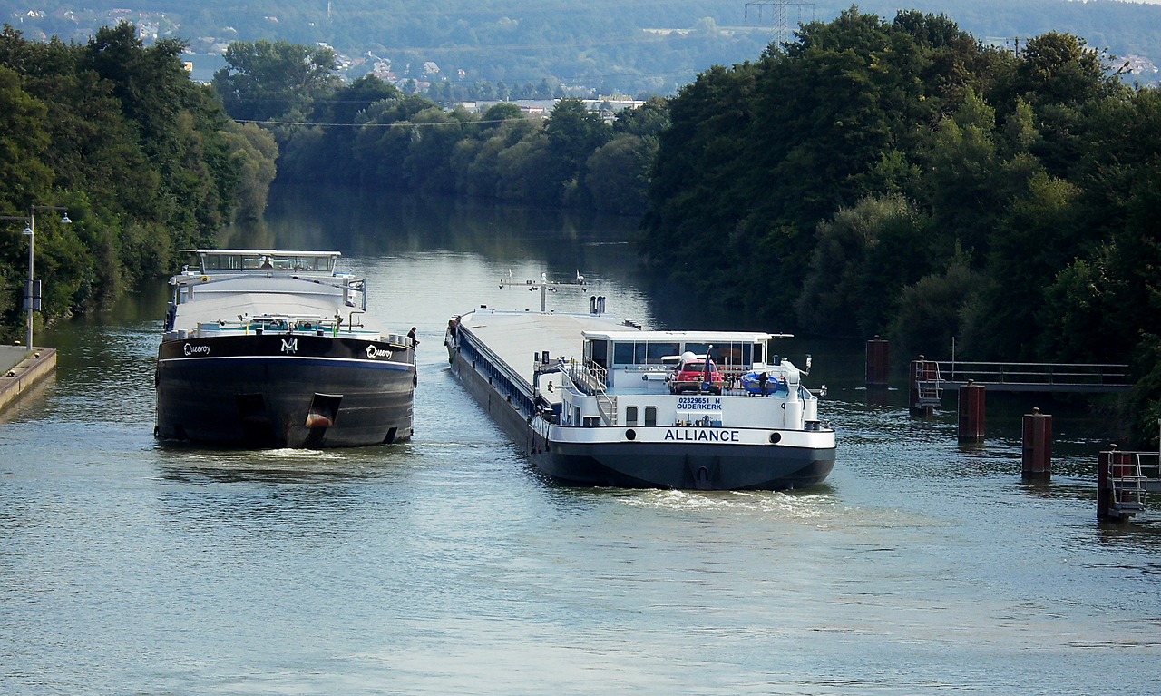main danube canal cargo ships against traffic free photo