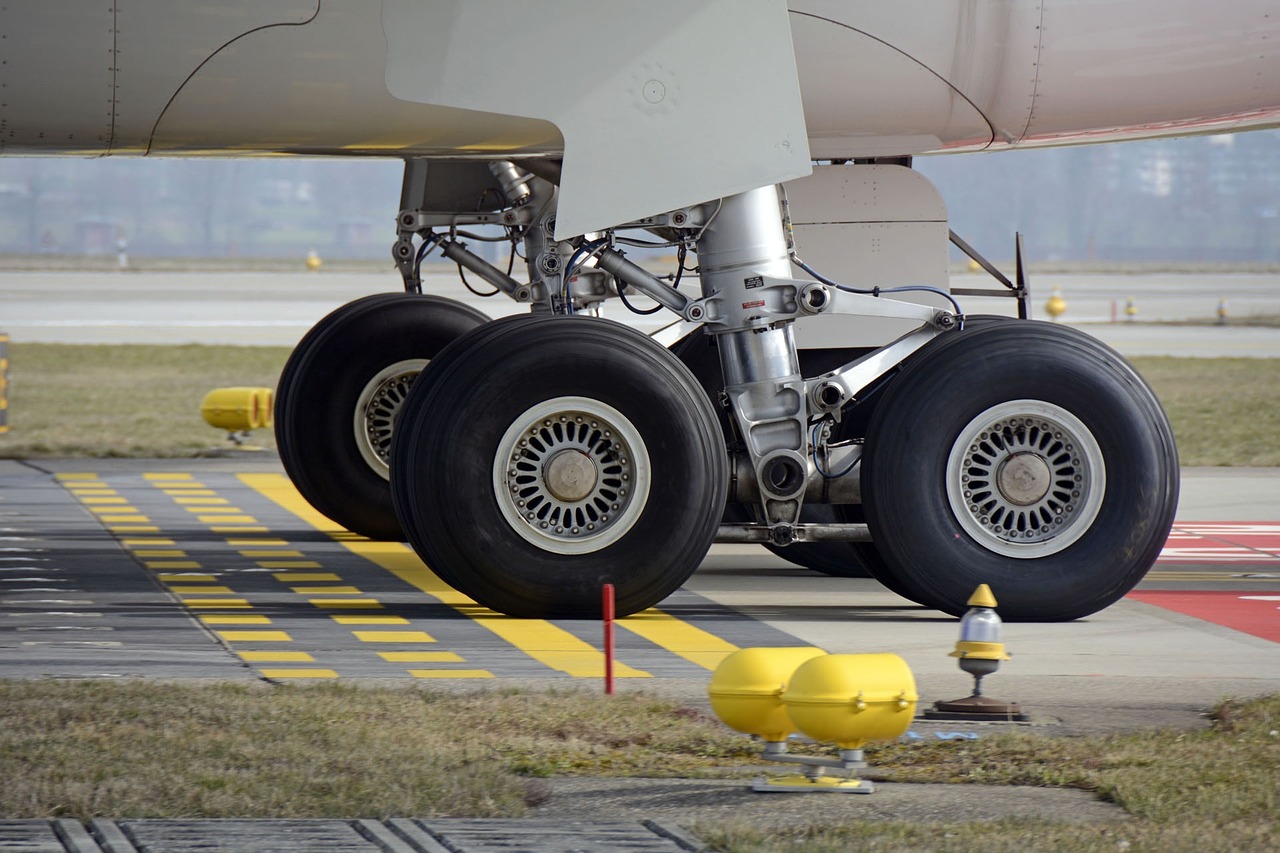 main landing gear aircraft wheel free photo