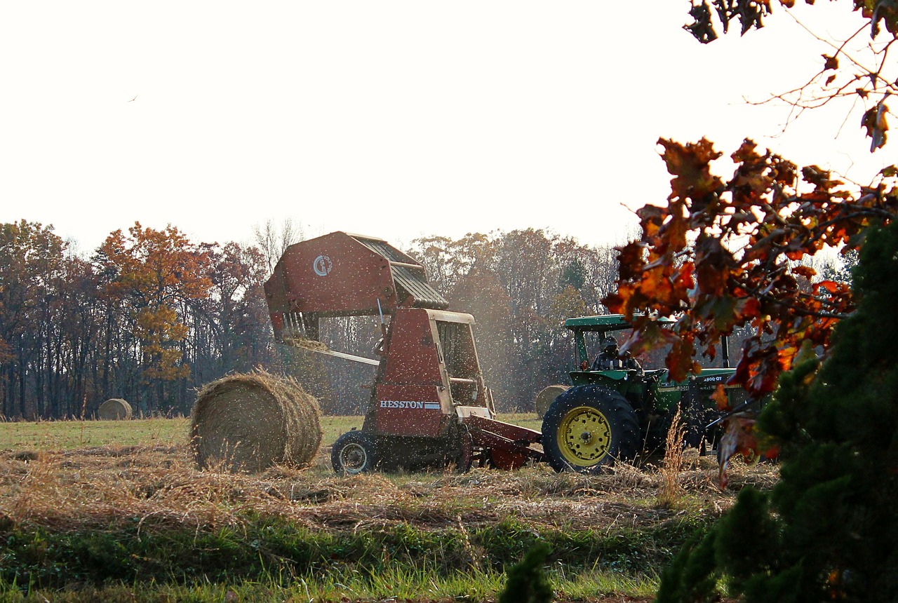 making hay farming tractor free photo