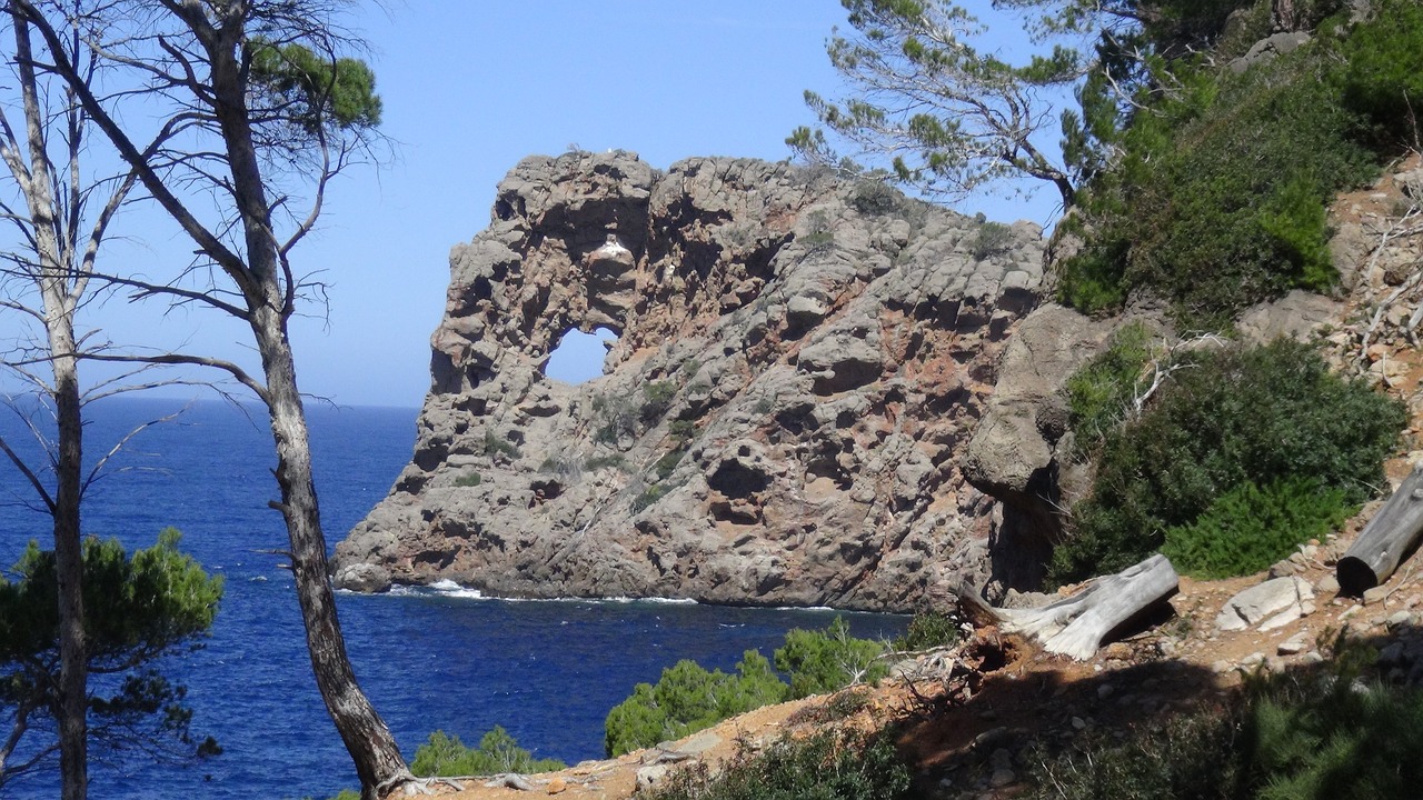 mallorca rock hole sea free photo