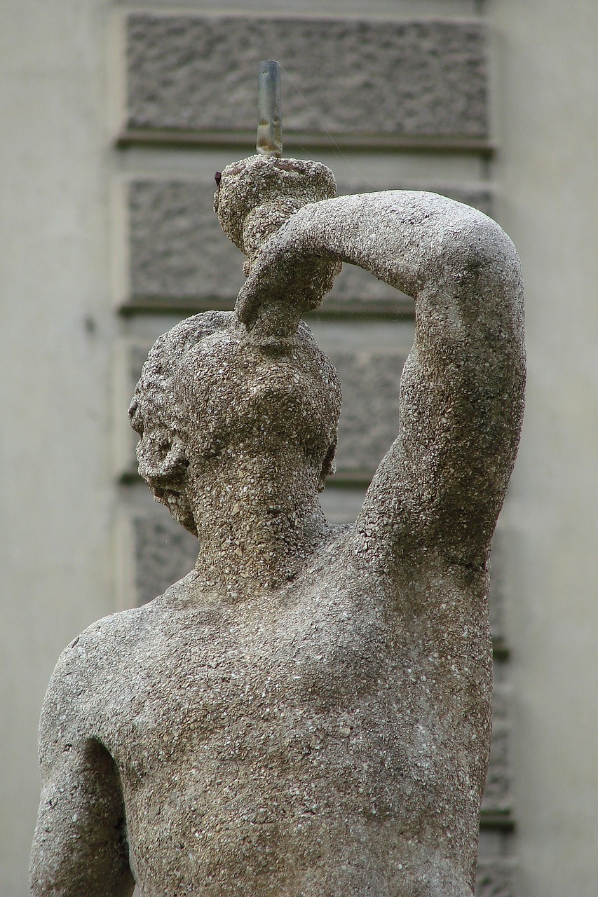 man fountain sculpture free photo