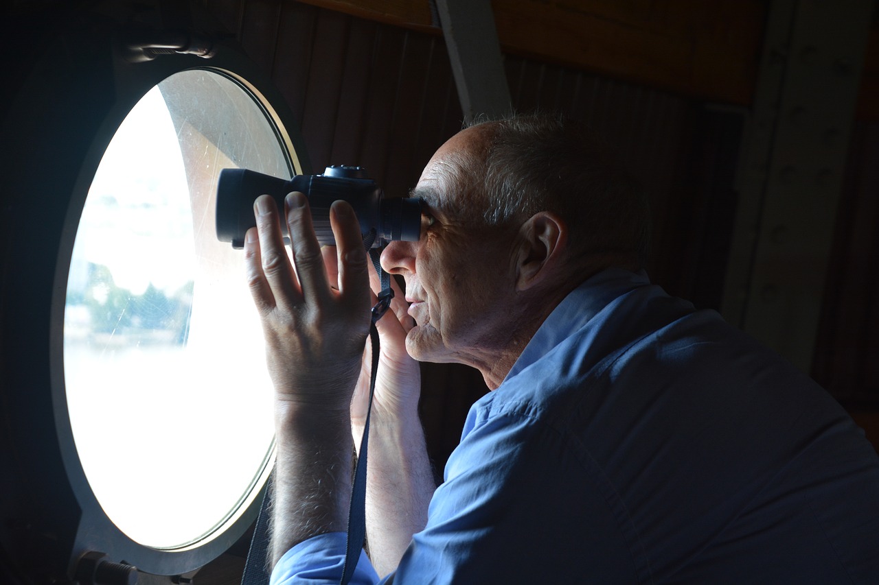 man binoculars outlook free photo