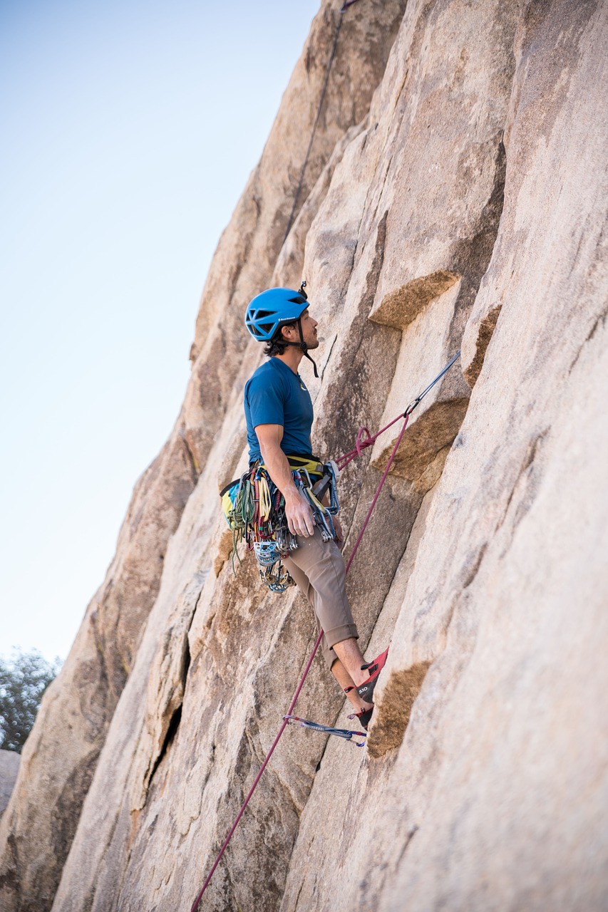 man climbing rope free photo