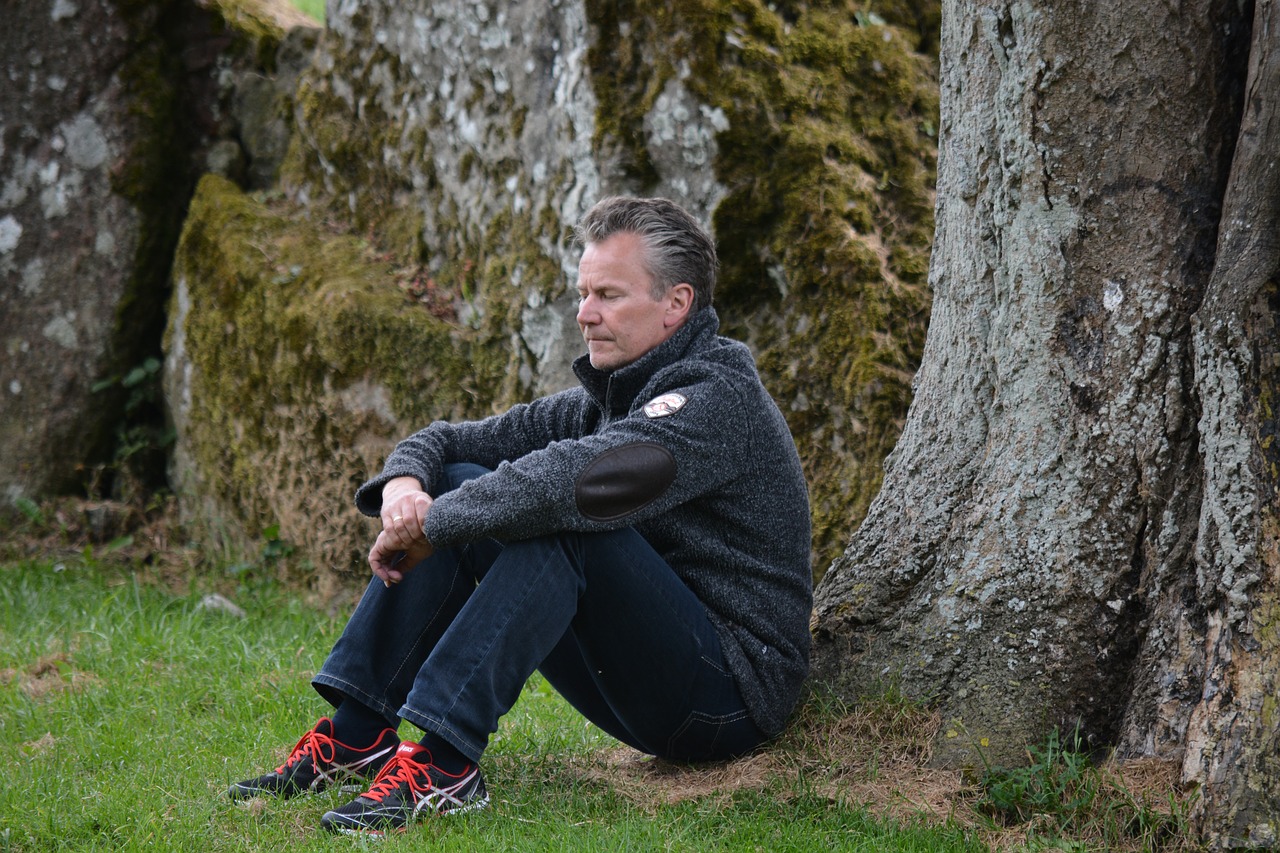 man meditation stone circle free photo