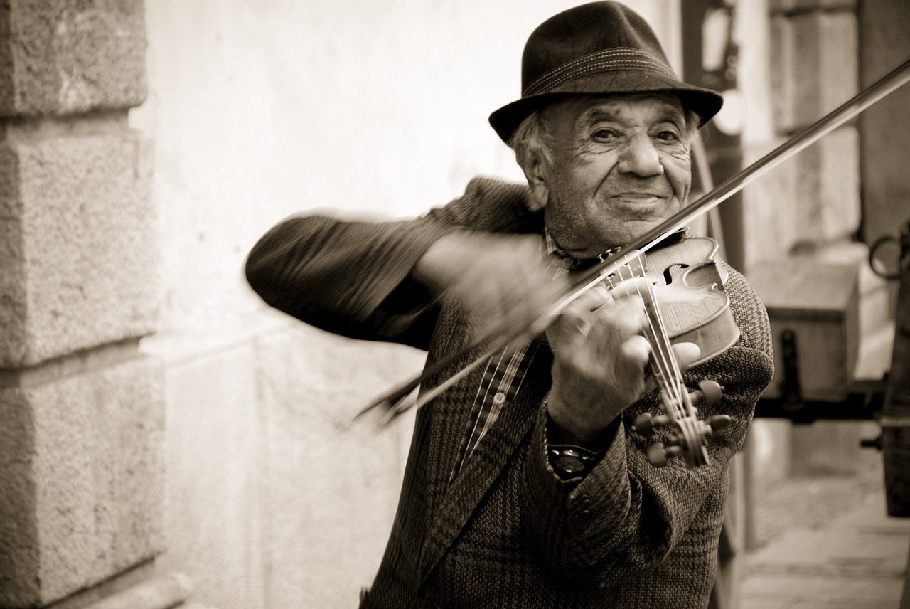 man violin street musicians free photo