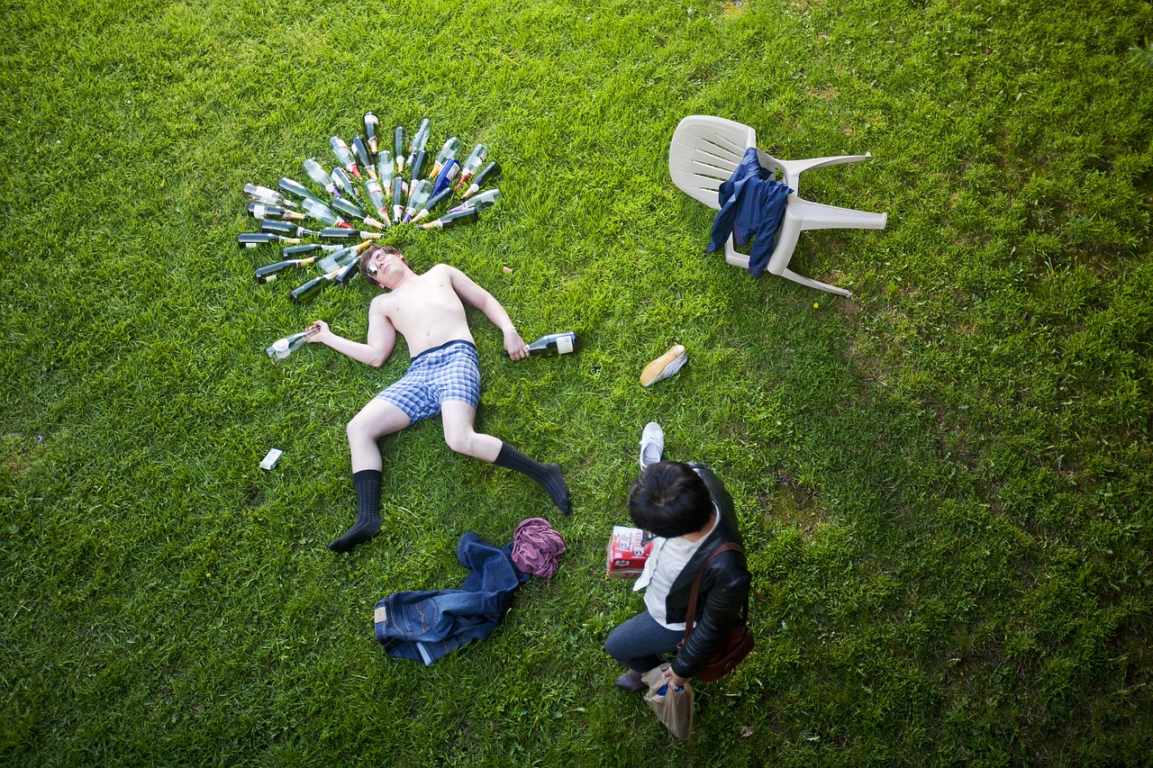 man passed out drinking free photo