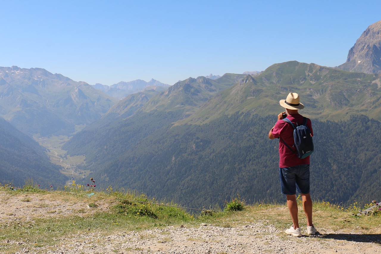 man  photographer  mountains free photo