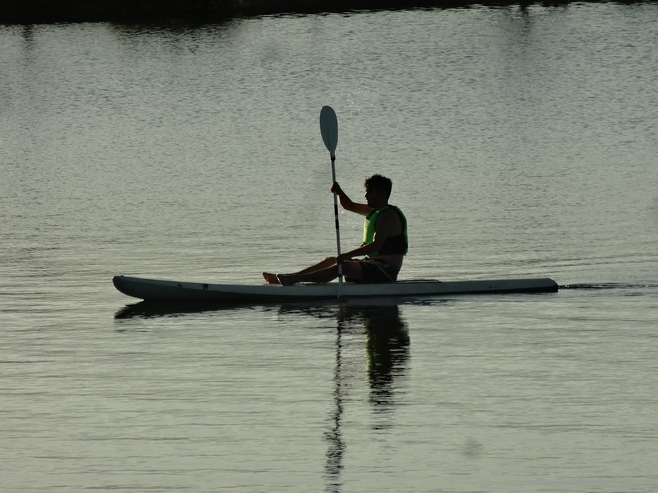 man kayak lake free photo