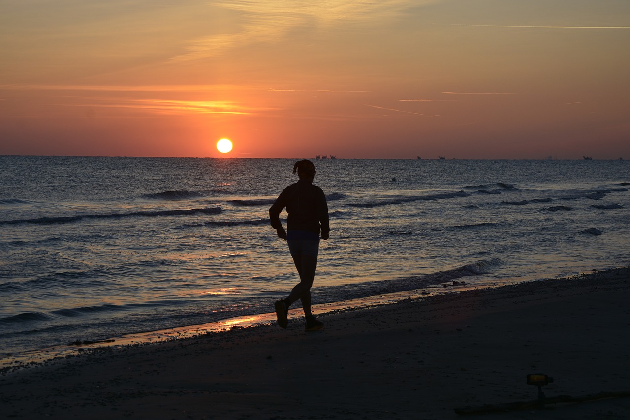 man  running  beach free photo