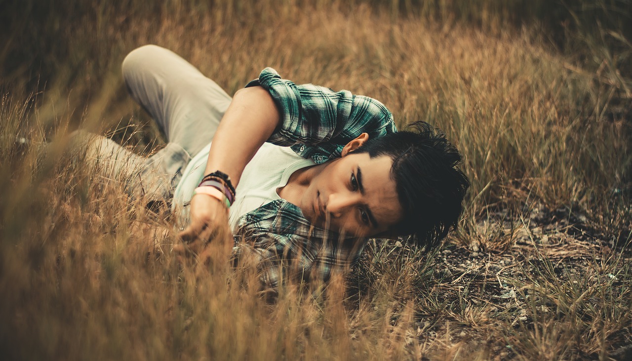 man  handsome man  man on grass free photo