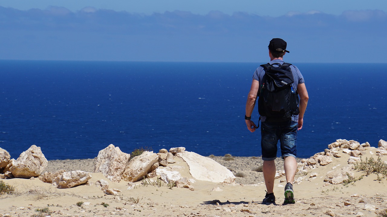 man  hiking  backpack free photo