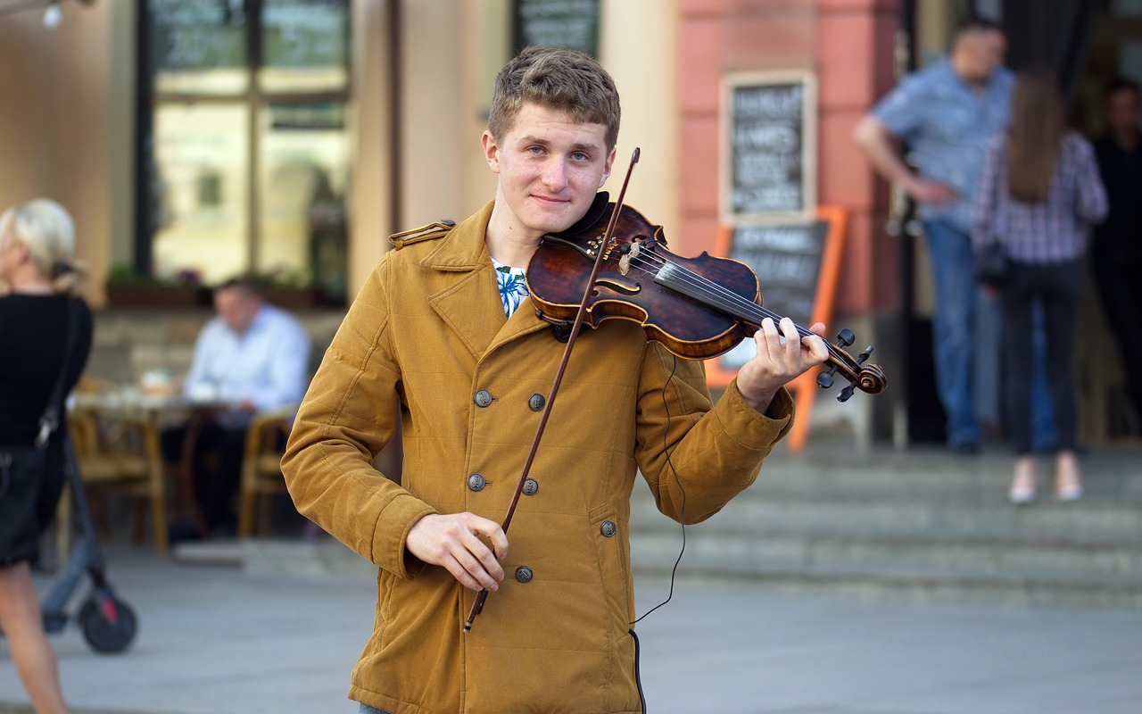 man  singing  violin free photo